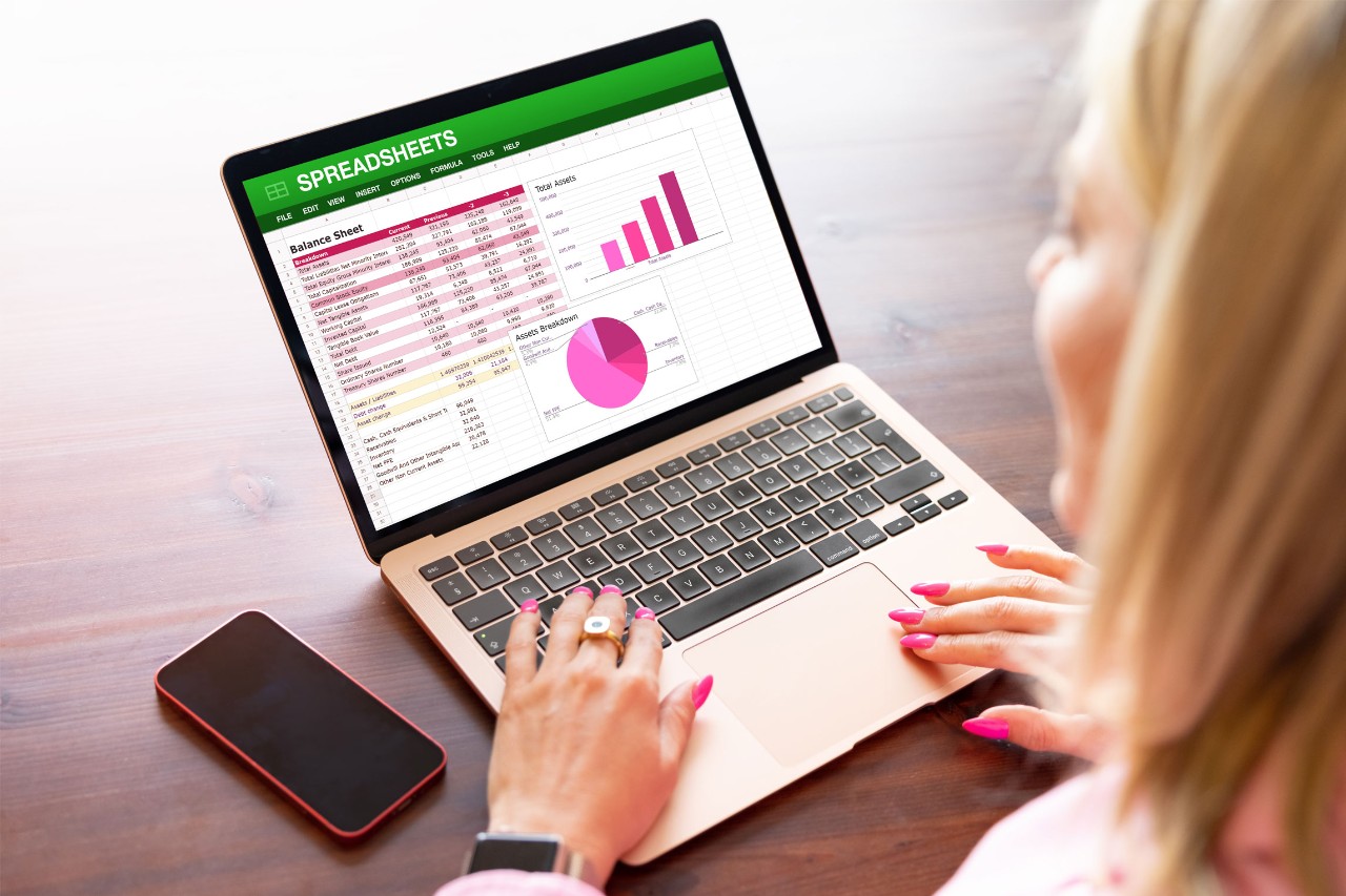 Woman working in excel spreadsheet