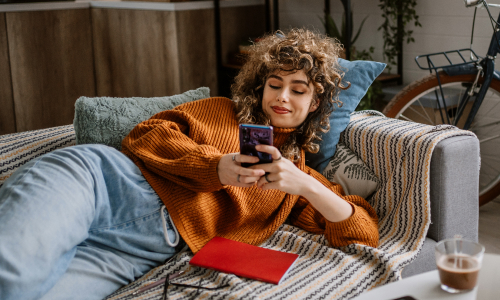 Man with head on the beach