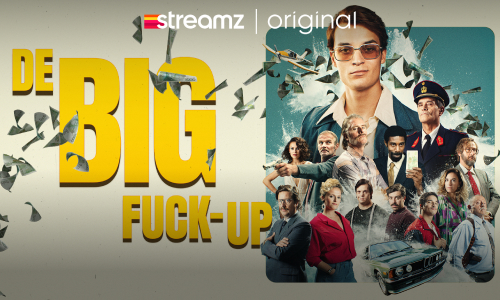 Man with head on the beach