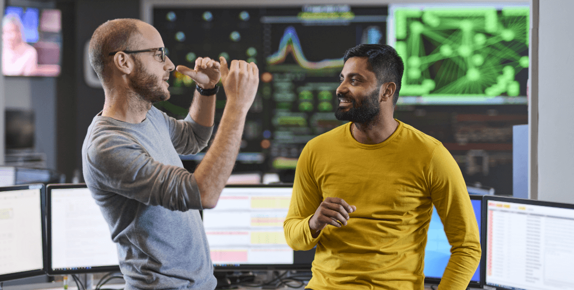 data engineers in front of screens