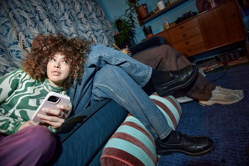 Woman chilling in sofa