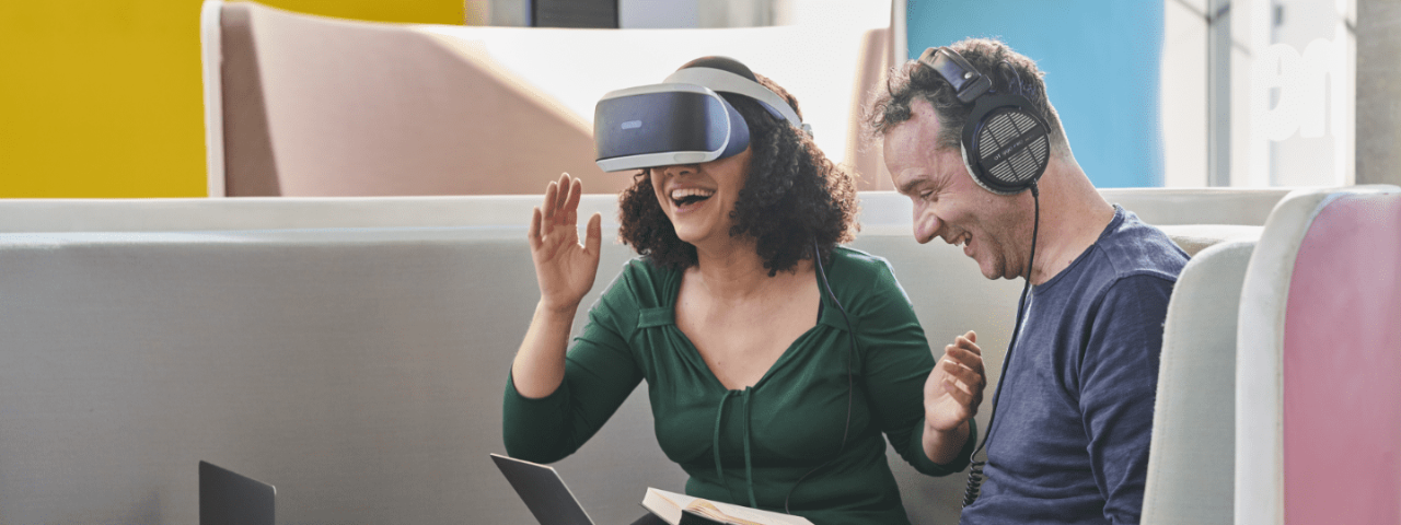 two colleagues testing vr glasses