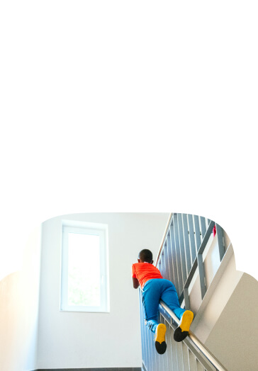 swivel-card-33percent-bg-kid-sliding-down-stair-railing.jpg